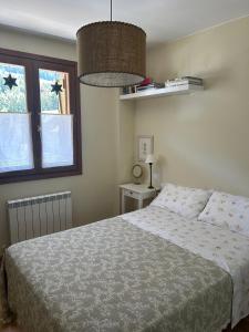 Postel nebo postele na pokoji v ubytování Sallent de Gállego - Formigal - Pirineos Sur