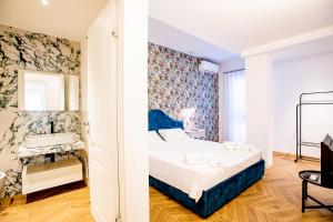 Postel nebo postele na pokoji v ubytování Casa Magnolia - Villa TerraFORTE