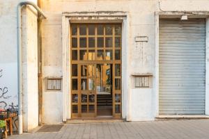 an open door to a building with a garage at Rhome to Colosseum in Rome