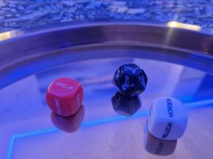 two red and white dice on a pool table at Sierra Love apartamento abierto in Prado del Rey