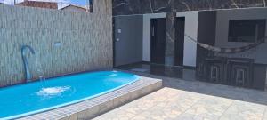Casa Praia Maragogi - Peroba内部或周边的泳池