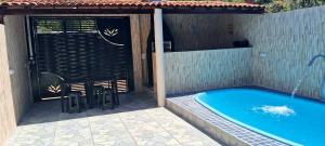 Casa Praia Maragogi - Peroba内部或周边的泳池