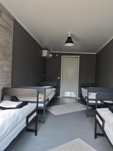 Postel nebo postele na pokoji v ubytování RUMMU Quarry Houses