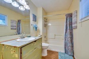 a bathroom with a sink and a toilet and a shower at Spacious Montgomery Home about 3 Mi to Downtown! in Montgomery +30 photos