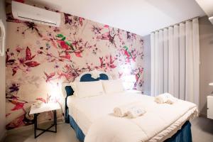 Postel nebo postele na pokoji v ubytování TerraFORTE Luxury Sicilian Villa