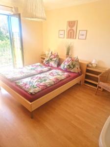 Postel nebo postele na pokoji v ubytování Gästehaus Anna Top 2
