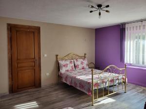 Vuode tai vuoteita majoituspaikassa CHEZ ESTER