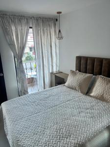 Postel nebo postele na pokoji v ubytování Hotel Lesus