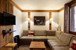 Μια τηλεόραση ή/και κέντρο ψυχαγωγίας στο Le Chalet De Montchavin - Magnifique appartement rénové MAE-4194