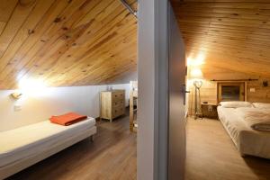 Ένα ή περισσότερα κρεβάτια σε δωμάτιο στο Le Chalet De Montchavin - Magnifique appartement rénové MAE-4194