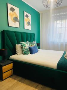 Ένα ή περισσότερα κρεβάτια σε δωμάτιο στο Blue Apartment close to Old Town