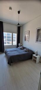 Postel nebo postele na pokoji v ubytování Apartment in seaside Helsinki 83M2 with Sauna boat to Estonia 450 m from apartment