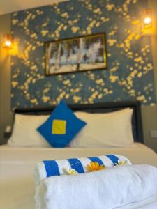 Letto o letti in una camera di Kuda Vilu, Mathiveri, Maldives
