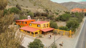 an overhead view of a house on the side of a road at Mai Jaii in Purmamarca