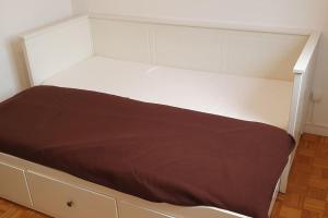 En eller flere senge i et værelse på Spacieux appartement Saint-Martin-d'Hères 4 pers