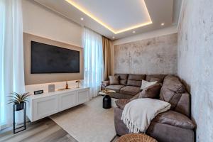 Ruang duduk di Apartment EMMA Gold with sauna