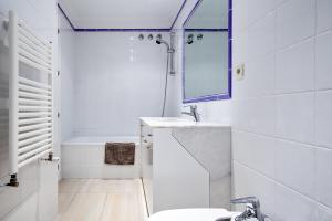 Kúpeľňa v ubytovaní Apartamentos Sonido de Mar + 16 fotografií