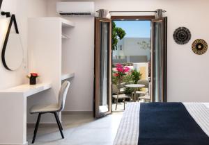 Santorinn Suites Fira客房内的一张或多张床位