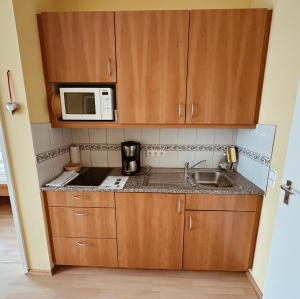 Kuchyň nebo kuchyňský kout v ubytování Ferienwohnung Ammersee