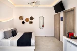 Santorinn Suites Fira客房内的一张或多张床位