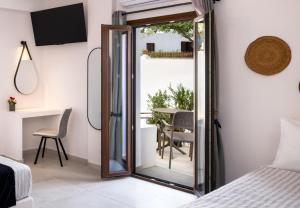 Santorinn Suites Fira客房内的一张或多张床位