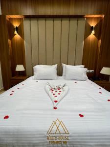 Postel nebo postele na pokoji v ubytování House Pyramids hotel