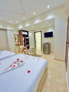 TV a/nebo společenská místnost v ubytování House Pyramids hotel