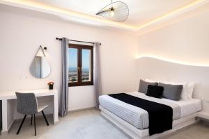 Santorinn Suites Fira客房内的一张或多张床位
