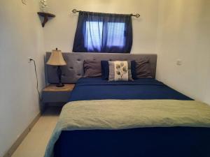 Ein Bett oder Betten in einem Zimmer der Unterkunft DB Tower Vacation Rental