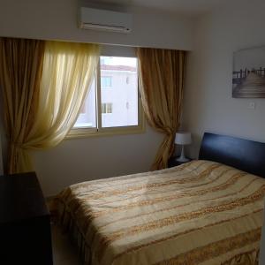 Ein Bett oder Betten in einem Zimmer der Unterkunft Elysia Park Apartment 203