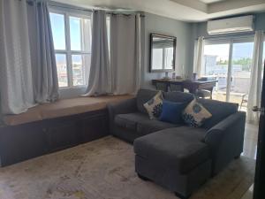 Ein Sitzbereich in der Unterkunft DB Tower Vacation Rental
