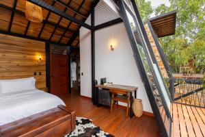 Katil atau katil-katil dalam bilik di Hotel Aborígenes