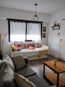 Postel nebo postele na pokoji v ubytování Una casita en la loma