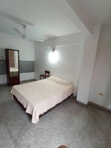 Postel nebo postele na pokoji v ubytování Amplio departamento céntrico + 5 fotografií