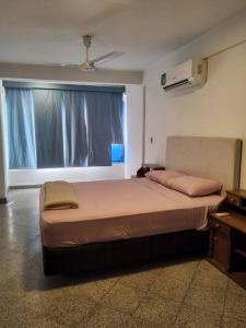 Postelja oz. postelje v sobi nastanitve Amplio departamento céntrico