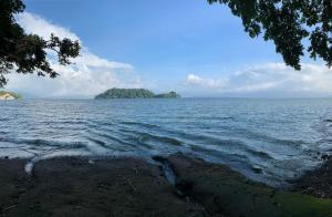 an island in the middle of a large body of water at Hotel Las Brisas in Catemaco +54 photos