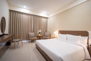 Posteľ alebo postele v izbe v ubytovaní The HUB Hotel - Airport