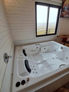 Foto dalla galleria di Cabana com Banheira Hidromassagem e Piso Aquecido a Urupema