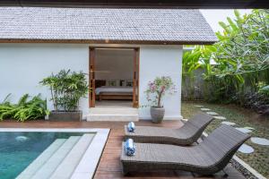 Πισίνα στο ή κοντά στο Floro Villa Canggu