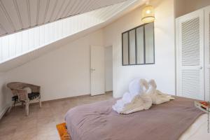 Postel nebo postele na pokoji v ubytování Superbe Duplex T2 Grand Rivière 3 étoiles + 28 fotografií