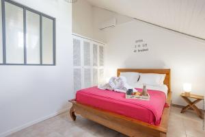 Postel nebo postele na pokoji v ubytování Superbe T2 Anse Noi re 3 etoiles + 20 fotografií