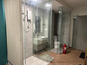 Et badeværelse på The Riv at Riveria City