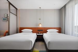 Yongji的住宿－永济希尔顿惠庭酒店，相簿中的一張相片 +16 張相片