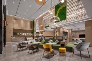 Ruang duduk di Home2 by Suite Wuhan Qingshan