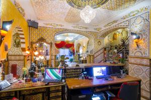 TV a/nebo společenská místnost v ubytování Hotel Mozart