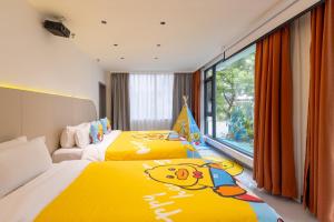 Suzhou Zhouzhuang Slowlife River View lnn客房内的一张或多张床位