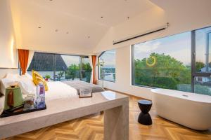 Suzhou Zhouzhuang Slowlife River View lnn客房内的一张或多张床位