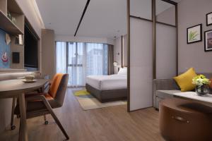 Katil atau katil-katil dalam bilik di Home2 by Suite Wuhan Qingshan