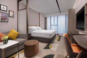 Katil atau katil-katil dalam bilik di Home2 by Suite Wuhan Qingshan