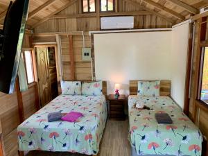 Postel nebo postele na pokoji v ubytování L'Oasis Don Juan